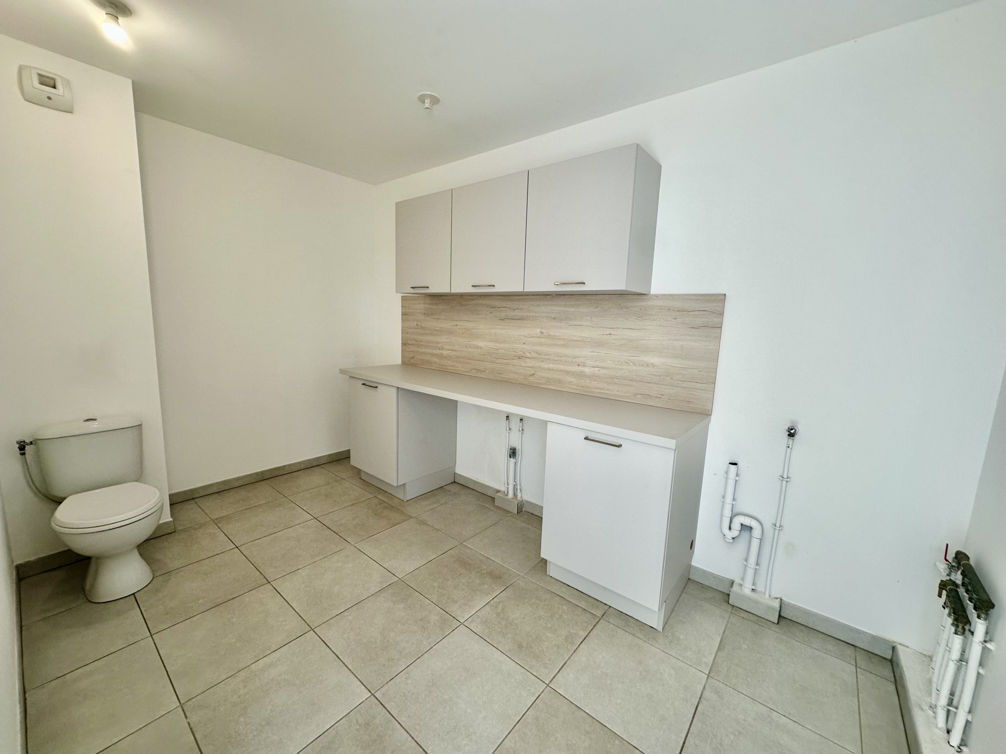 Cellier / buanderie / wc